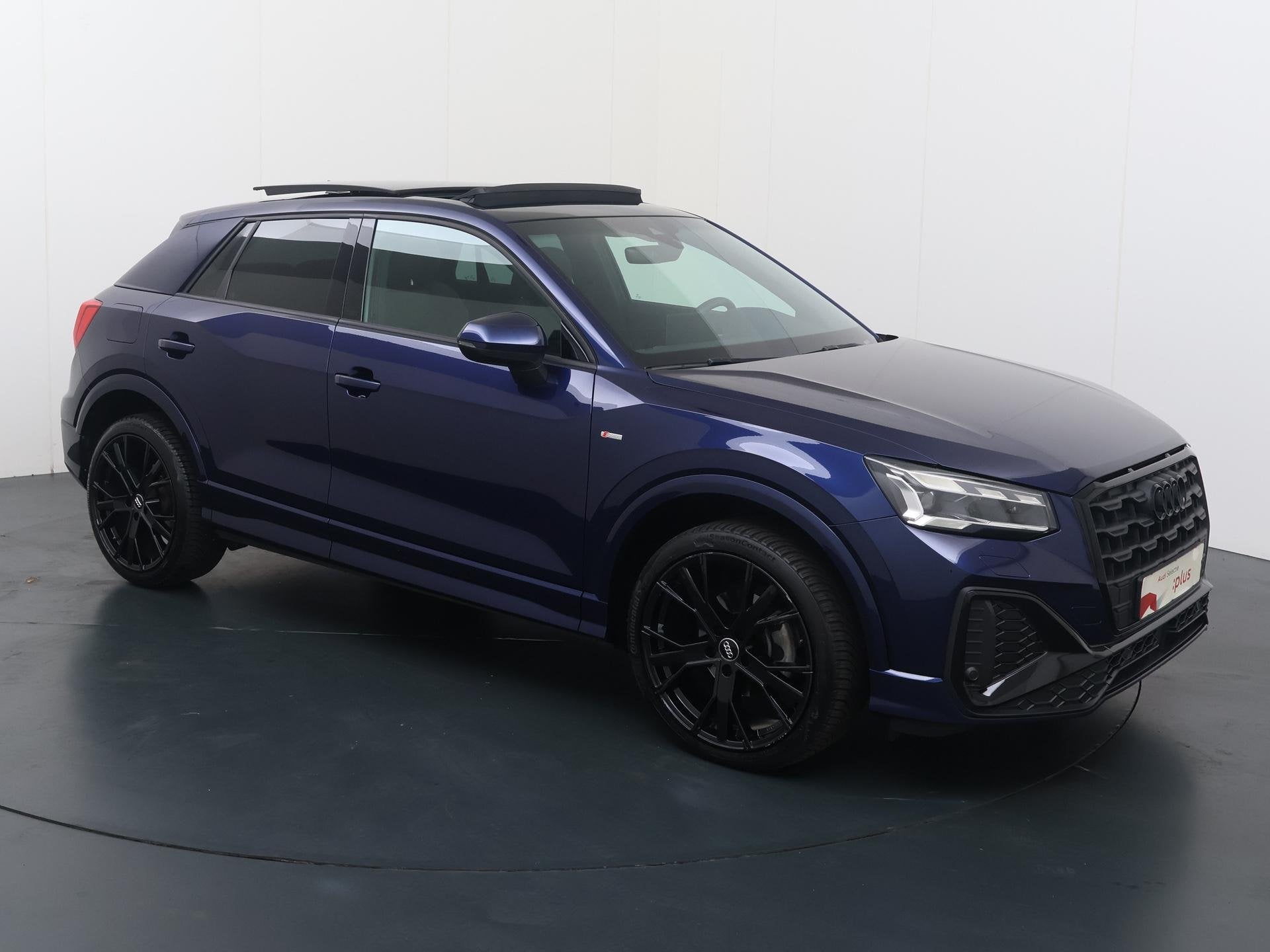Audi Q2 35 TFSI S Edition | 150 PK | Automaat | Trekhaak |, Auto's, 12 maanden, 4 cilinders, Blauw, Leder en Stof