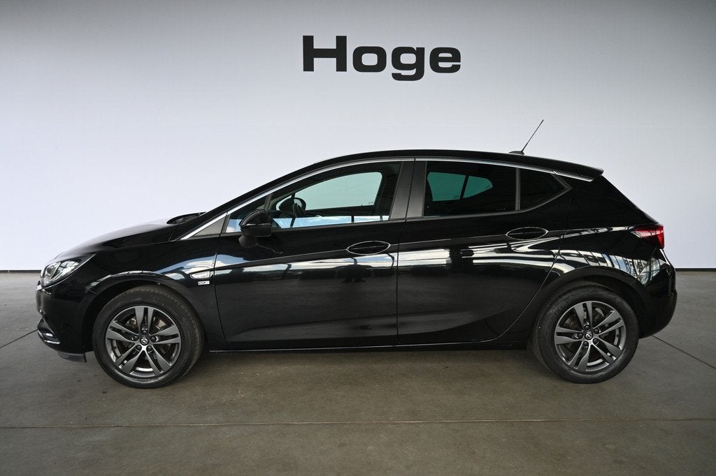 Opel Astra 1.0 Turbo 120 Jaar Edition Airco Navigatie Carpla, Auto's, Opel, Stof, Gebruikt, Met garantie (alle), 610 kg