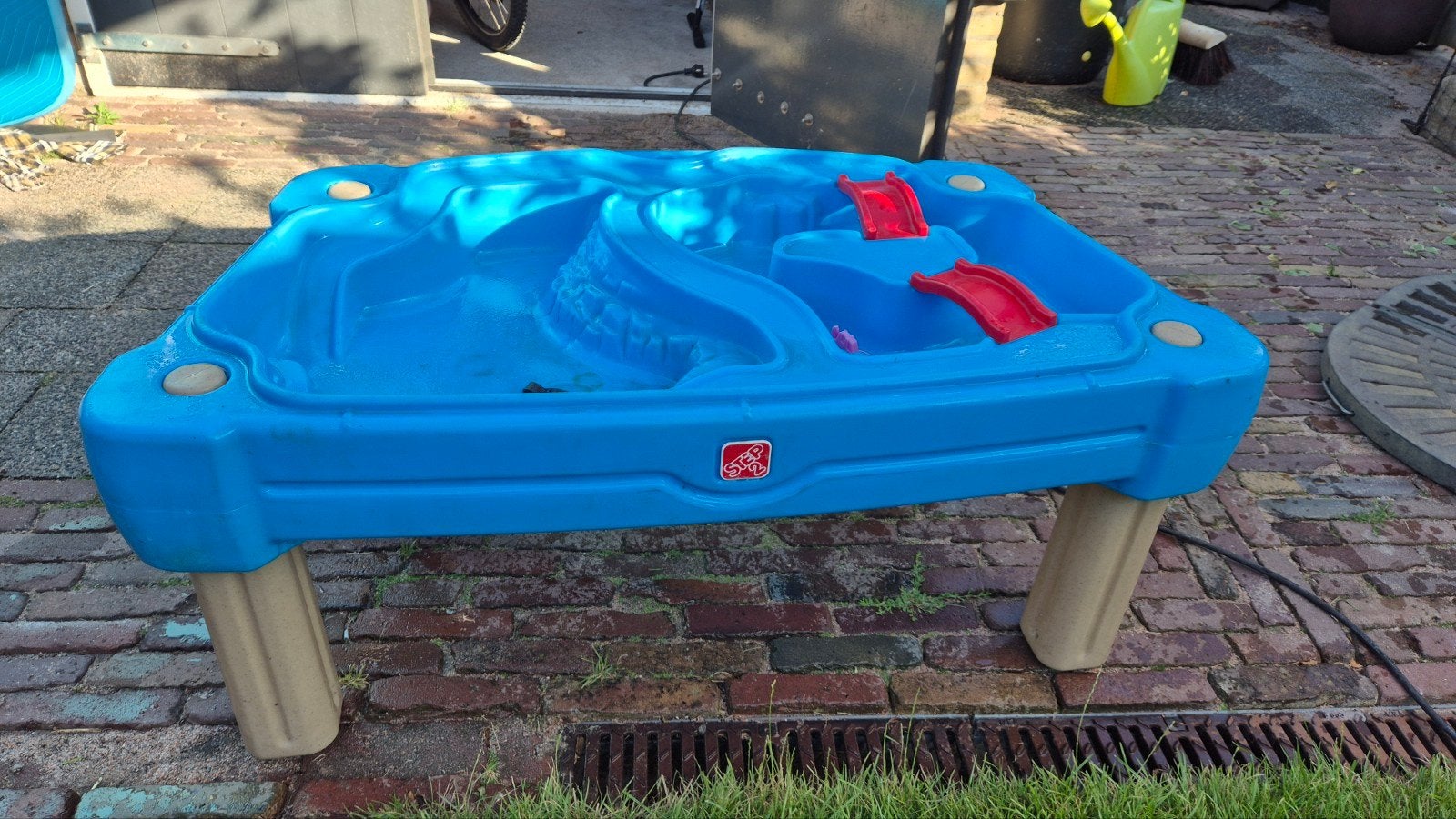 Water/zand tafel, Ophalen