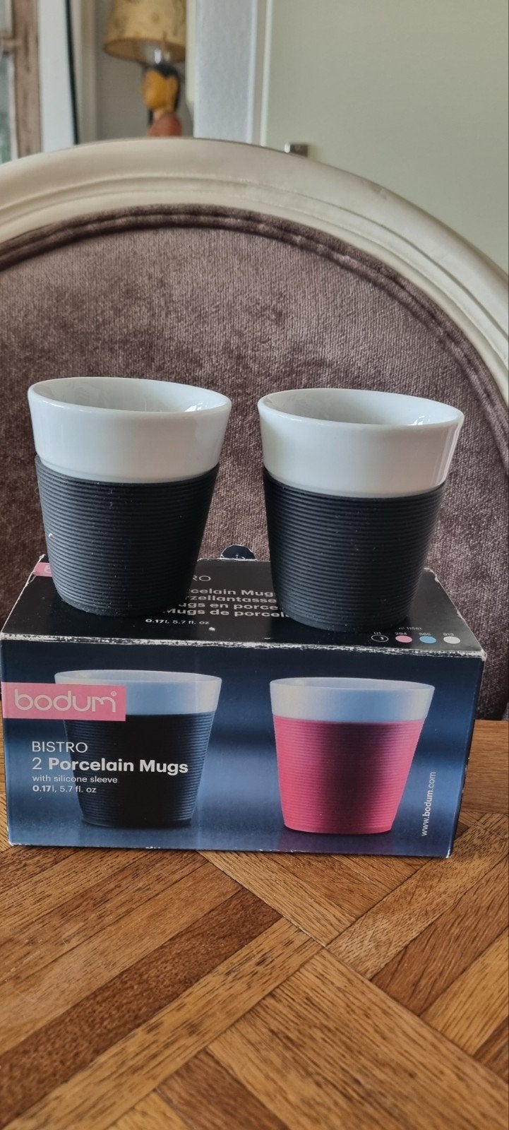 Bodum Bistro Porseleinen Mokken met Siliconen Hoes (2 stuks), Huis en Inrichting, Nieuw, Ophalen of Verzenden, Overige stijlen
