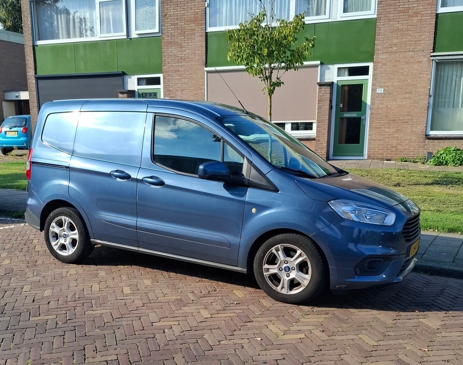 Ford Transit Courier GB 1.5 Tdci Duratorq 100pk 2021 Blauw, Voorwielaandrijving, 1263 kg, Stof, Verwarmde buitenspiegels