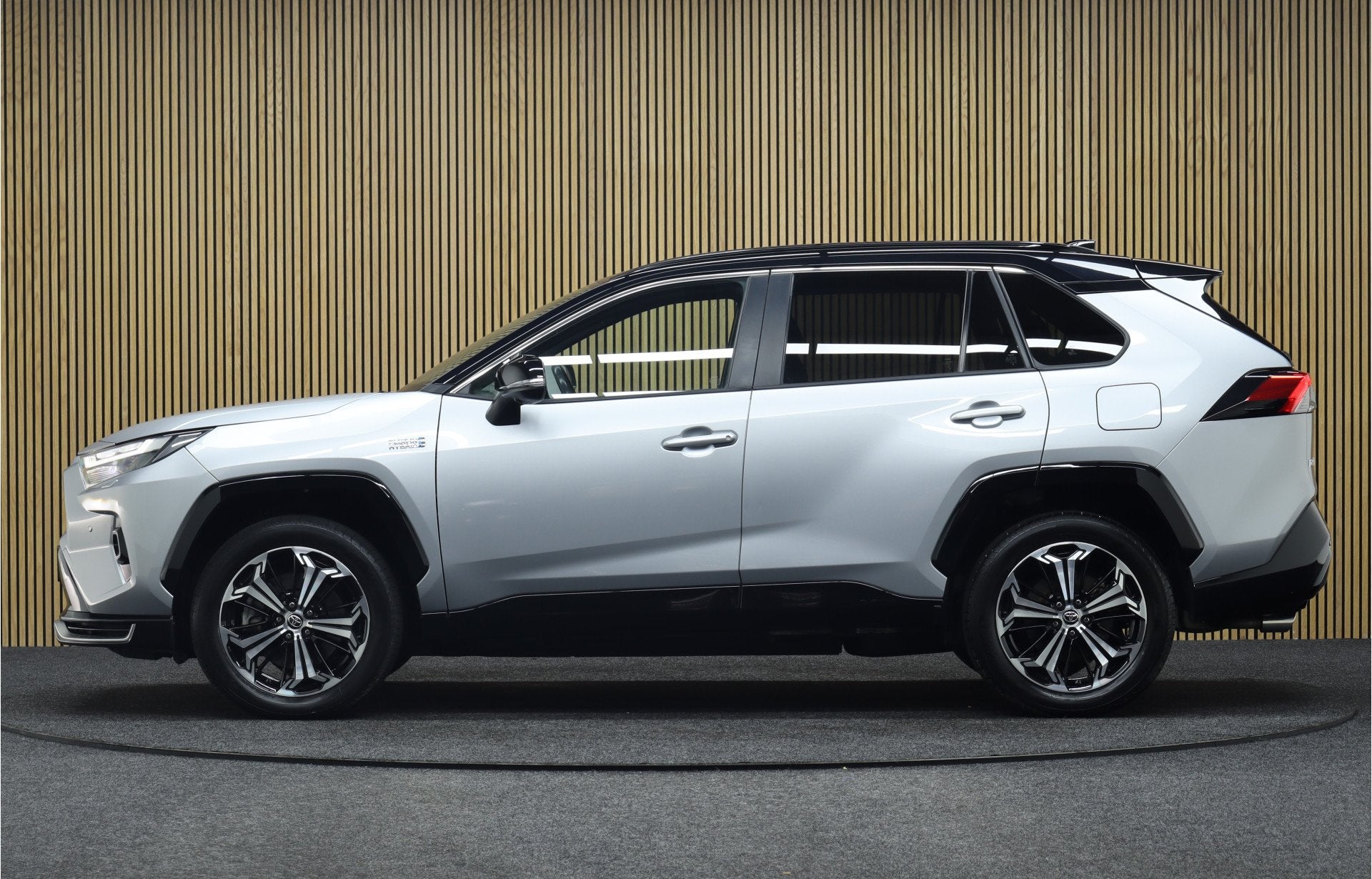 Toyota RAV4 2.5 Plug-in Hybrid AWD Style Bi-Tone | 306 pk |, Gebruikt, Zwart, 4 cilinders, Bedrijf