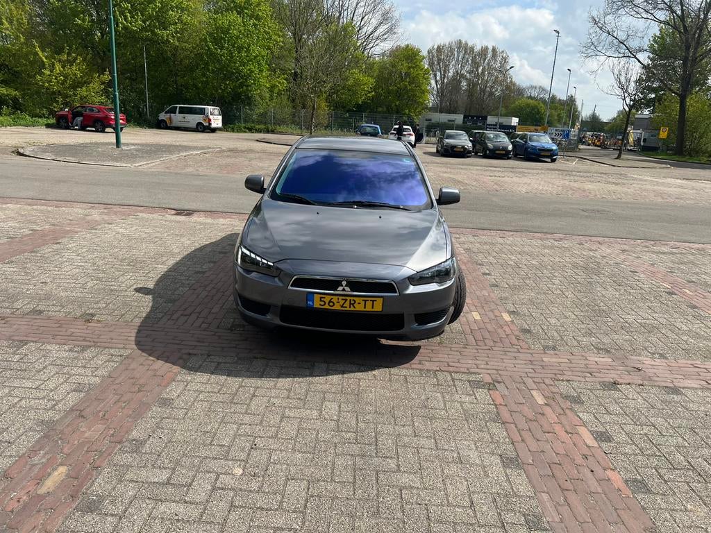 Mitsubishi Lancer 1.5 Mivec Sports Sedan 2008 Grijs, Auto's, Voorwielaandrijving, 4 cilinders, Origineel Nederlands, LED verlichting