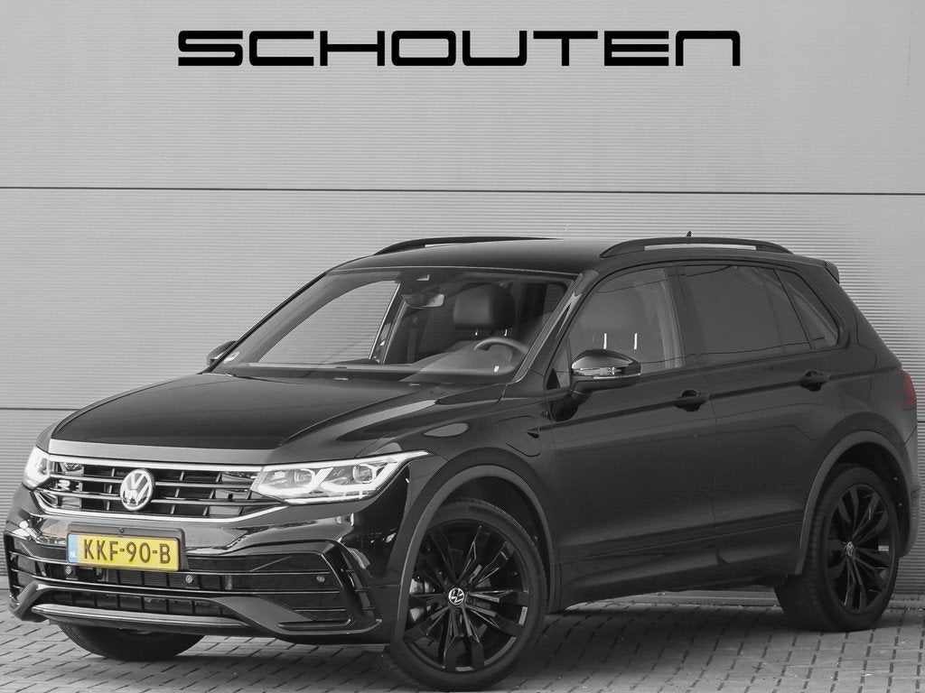 Volkswagen Tiguan 1.4 TSI eHybrid R-Line 360° Black Pack 20, Auto's, Volkswagen, Gebruikt, Zwart, 4 cilinders, Leder en Stof