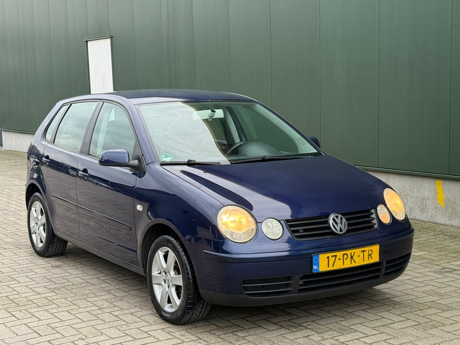 Volkswagen Polo 1.4 55KW AUT 2004 Blauw, Auto's, Volkswagen, 74 pk, Blauw, 49 €/maand, Origineel Nederlands