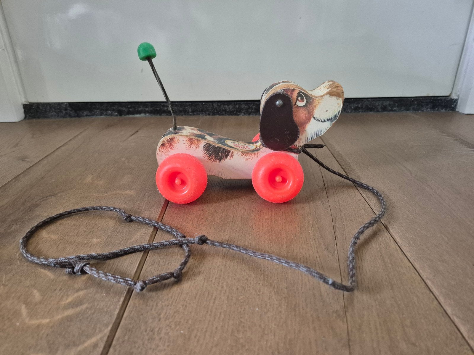 Houten loop hondje, Ophalen