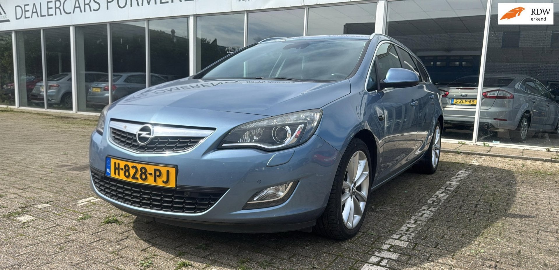 Opel Astra Sports Tourer 1.4 Turbo Sport, Voorwielaandrijving, Euro 5, Stof, Gebruikt