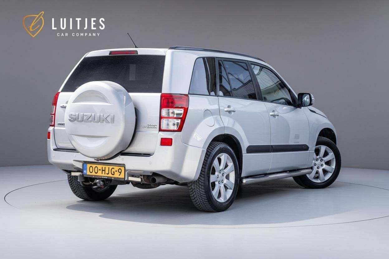 Suzuki Grand Vitara 2.4 4WD 169pk AUT High Executive |Schuif, Auto's, Automaat, Gebruikt, 4 cilinders, Stoelverwarming
