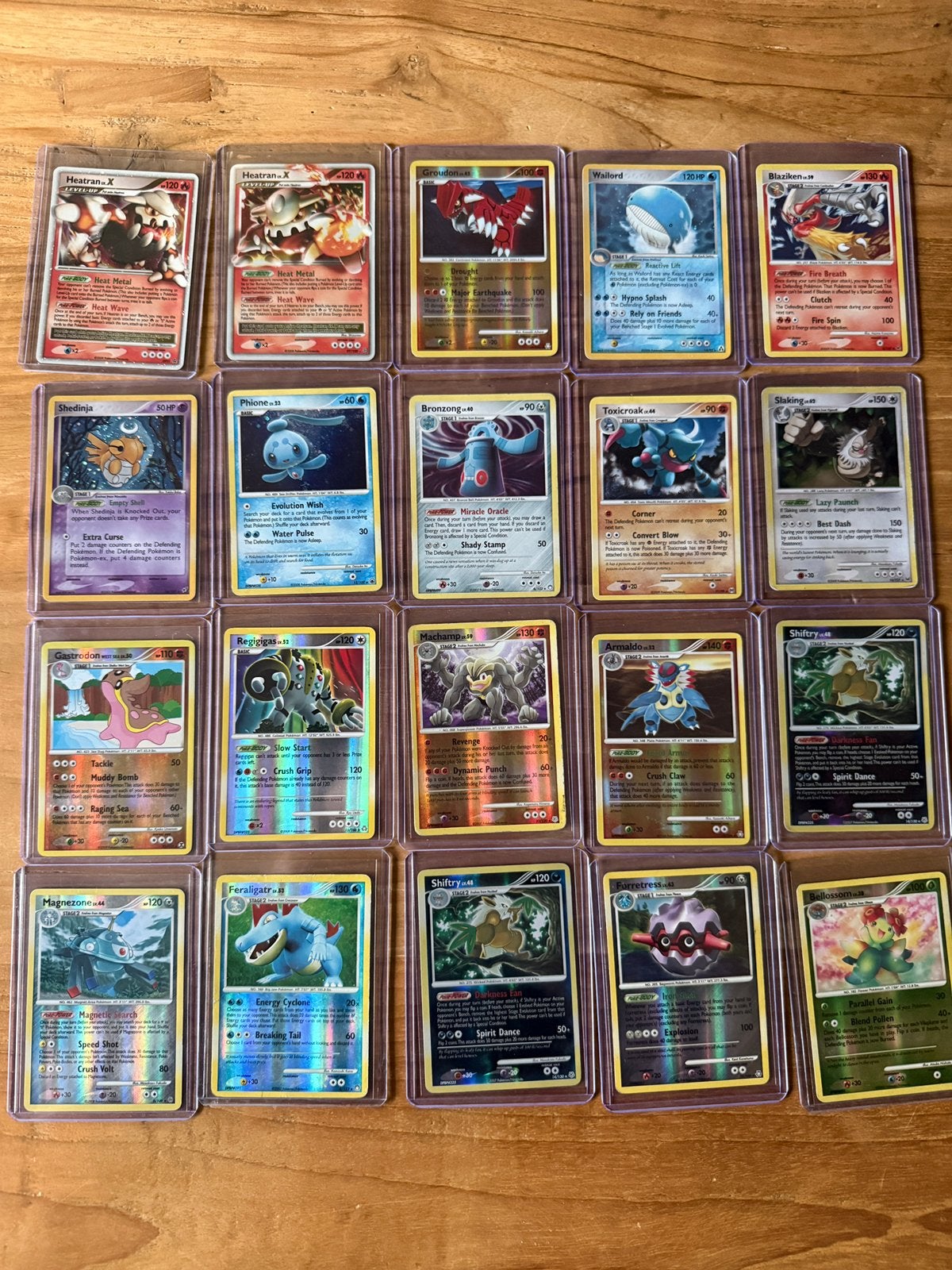 20 Pokémon kaarten-2 Heatran LV.X, holo’s en reverse holo’s, Ophalen of Verzenden, Zo goed als nieuw, Meerdere kaarten