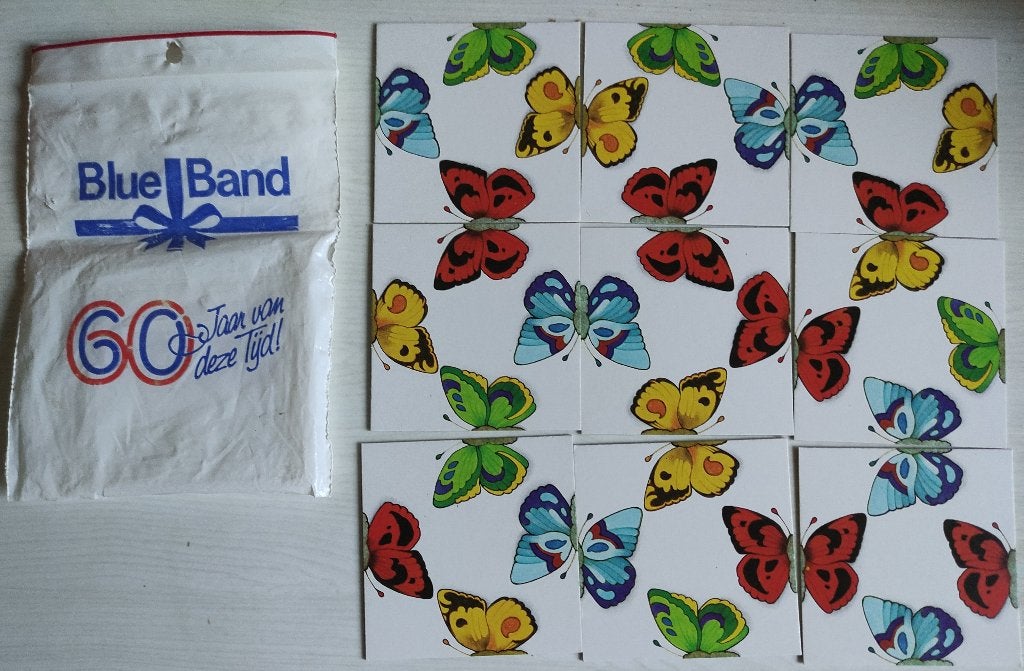negenspel reclame van BLUE BAND 60 jaar met vlinders 1983, Ophalen of Verzenden, Minder dan 500 stukjes, Zo goed als nieuw, Overige typen