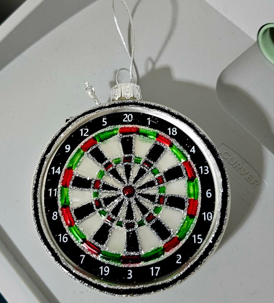 Kerstbal dartbord, Ophalen