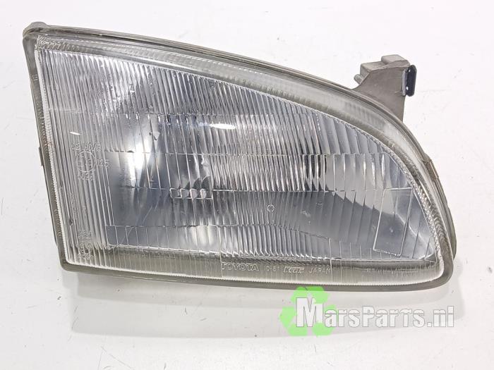 Koplamp rechts van een Toyota Starlet, Gebruikt, -, -, Ophalen of Verzenden