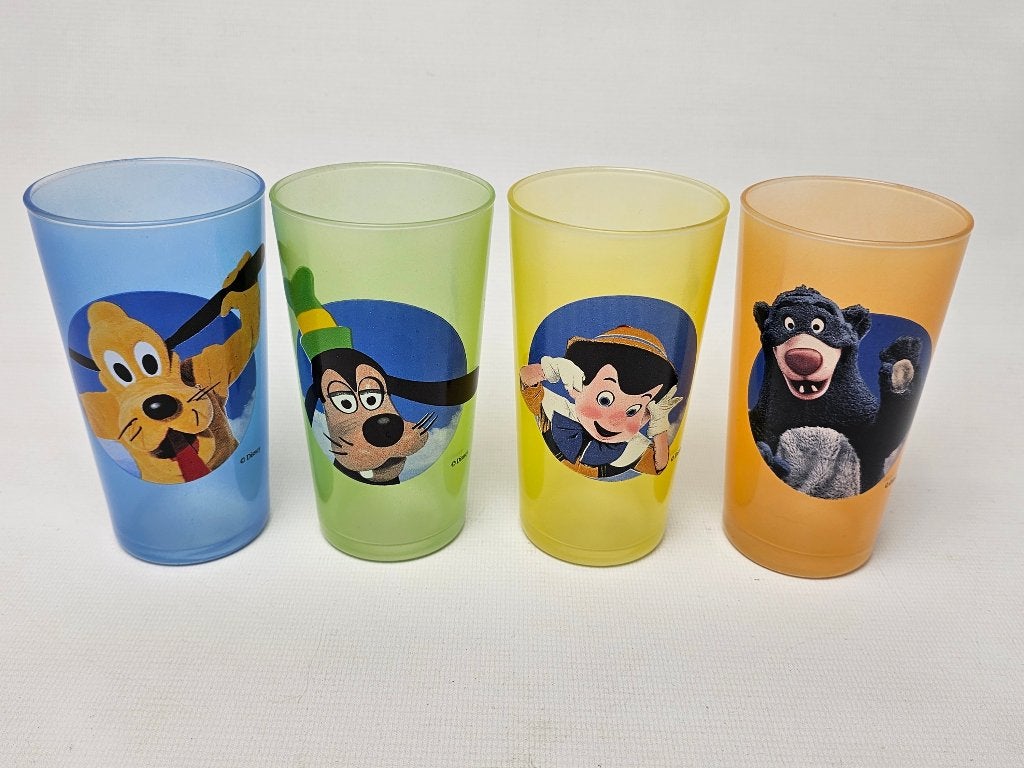 # 4 Disney glazen met Pluto, Goofy, Pinokkio en Baloe, Ophalen of Verzenden, Overige figuren, Gebruikt, Servies