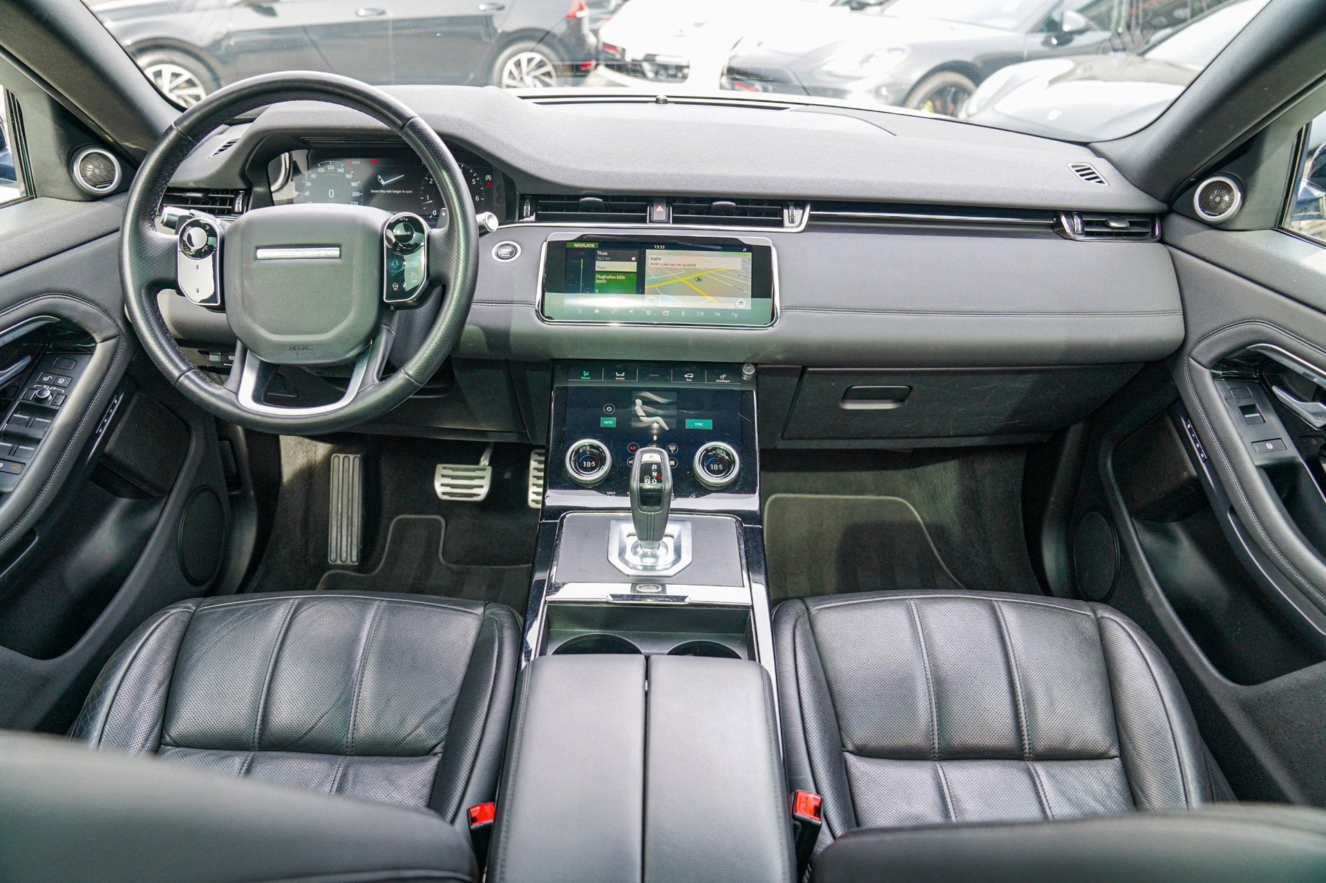 Land Rover Range Rover Evoque 2.0 P200 AWD R-Dynamic HSE | P, Auto's, Land Rover, 1800 kg, 4 cilinders, Wit, Leder