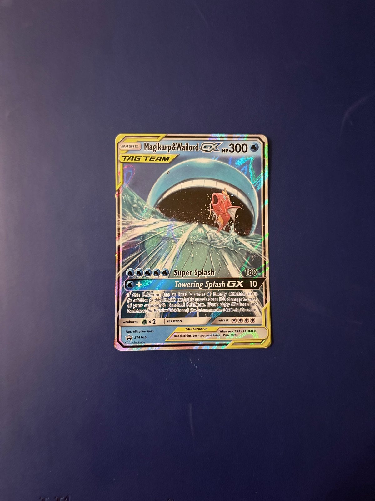 Pokémon TCG: Tag Team Magikarp Wailord GX SM166 Promo, Ophalen of Verzenden, Zo goed als nieuw, Losse kaart, Foil