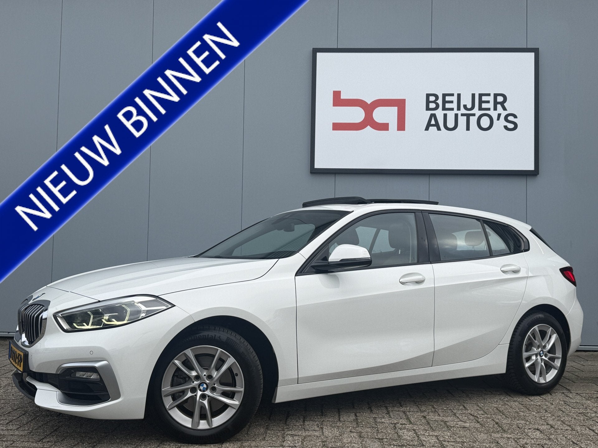 BMW 1-serie 118i High Executive Automaat/Pano/Apple Carplay., Verwarmde buitenspiegels, Gebruikt, Wit, Leder
