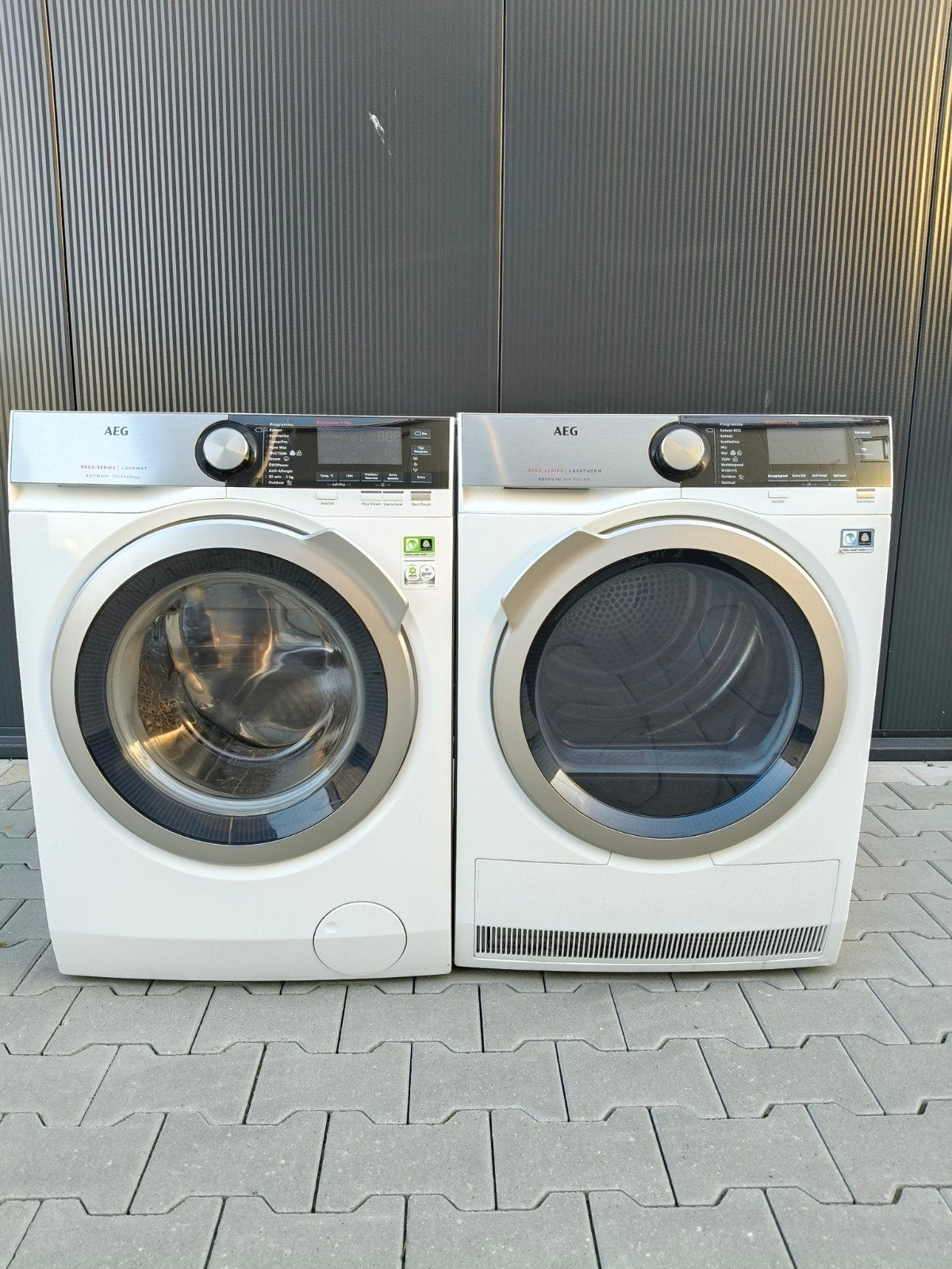 Aeg wasmachine 9 kg met warmtepomp droger 9kg (set), 8 tot 10 kg, Ophalen, Zo goed als nieuw, 85 tot 90 cm