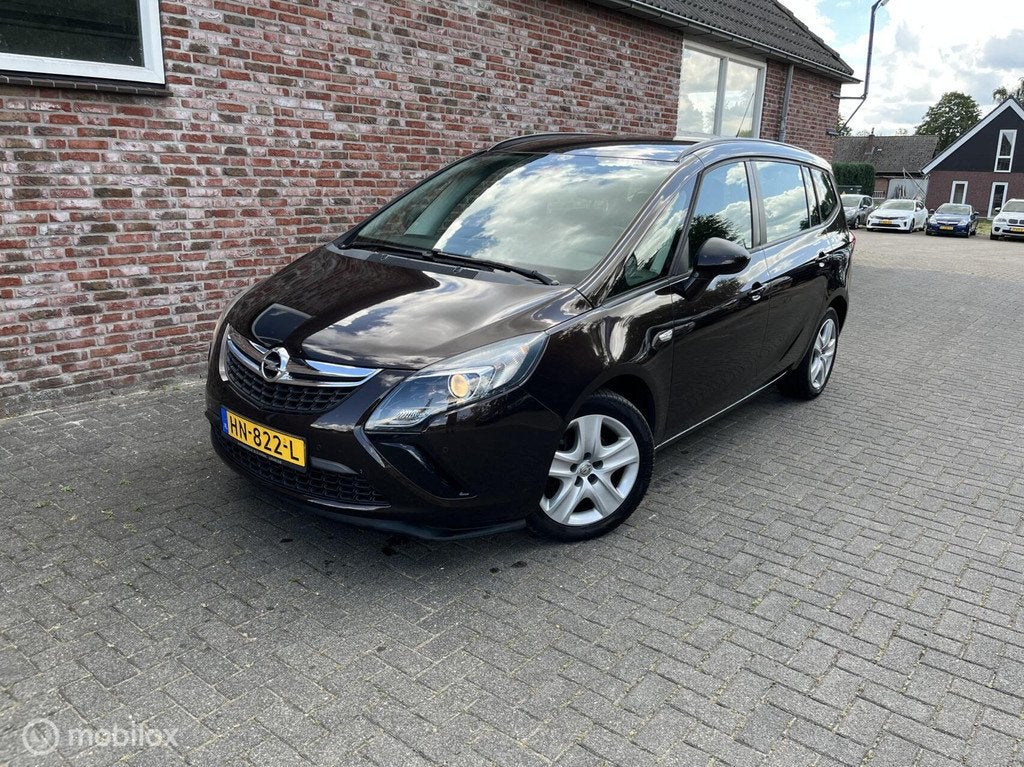 Opel Zafira Tourer 1.4 Cosmo, Auto's, Opel, Euro 5, 4 cilinders, Bruin, Bedrijf