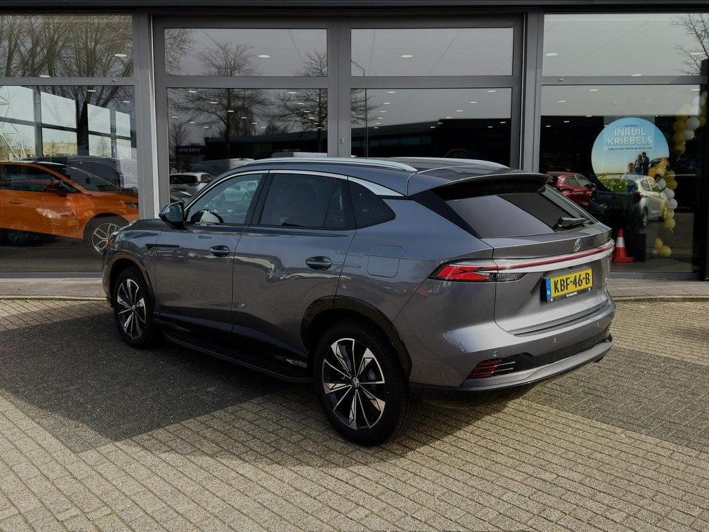 MG HS PHEV 1.5 272pk Aut. Luxury | 100km Electrisch | Bruin, Auto's, MG, 12 maanden, Gebruikt, 4 cilinders, 21 kWh