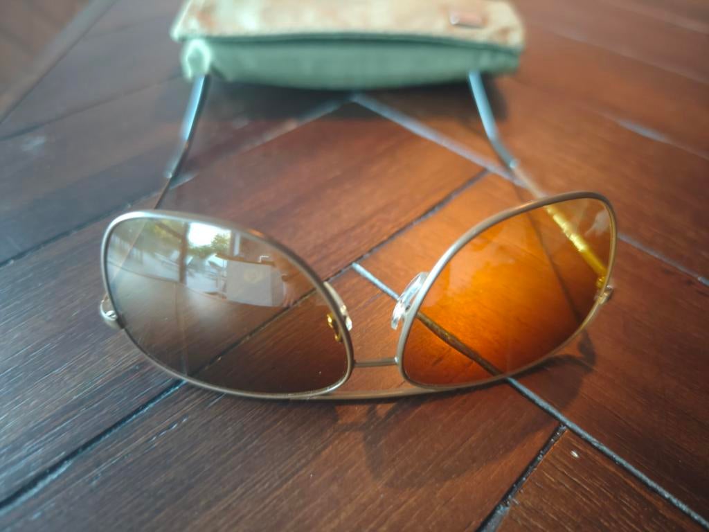 Vintage Serengeti Zonnebril met originele hoes, Overige merken, Gebruikt, Zonnebril, Ophalen of Verzenden