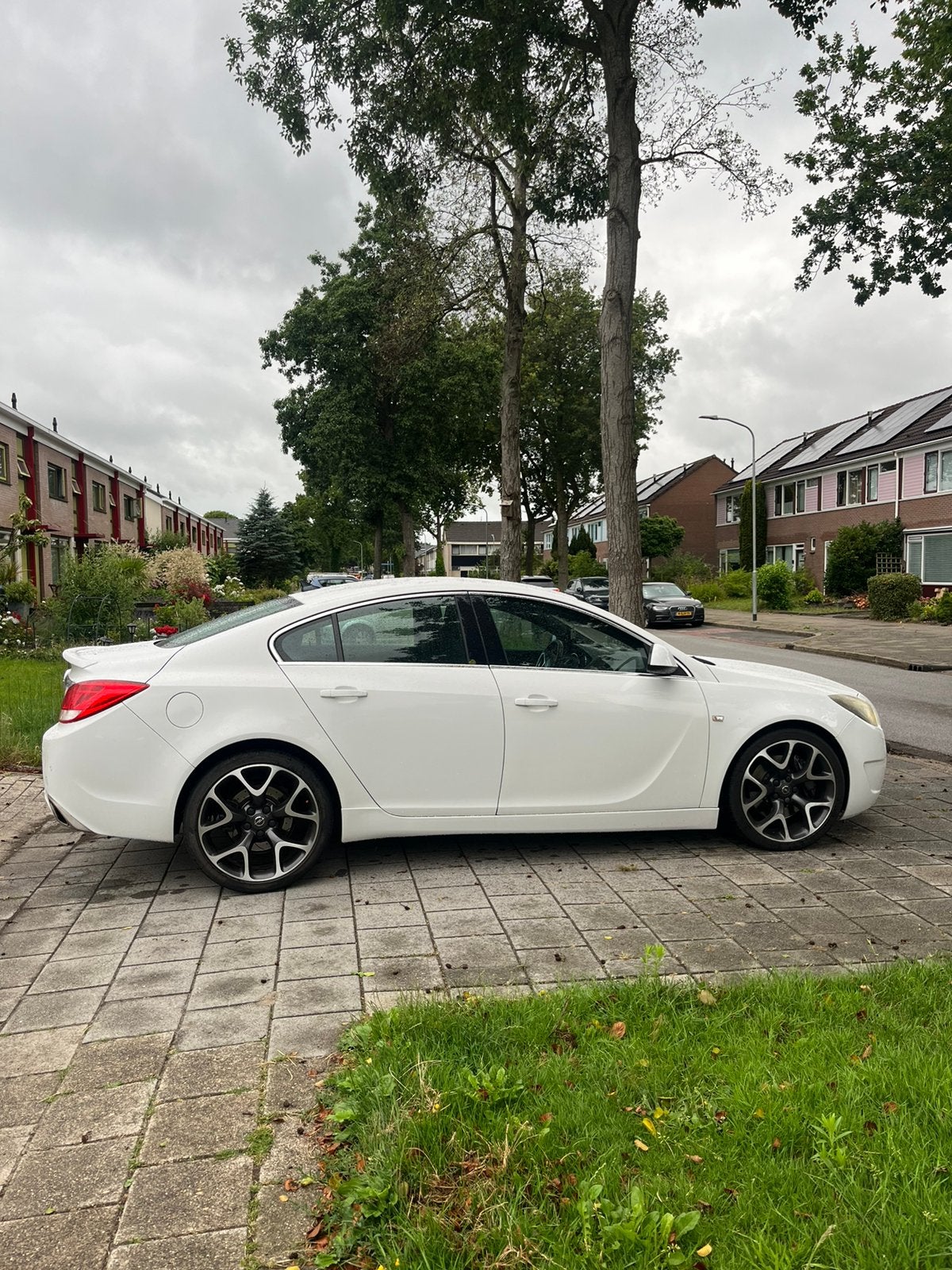 Opel Insignia 2.8 Turbo 239KW 4-DRS 4X4 2010 Wit, Auto's, Opel, Parkeersensor, Zwart, Wit, Leder