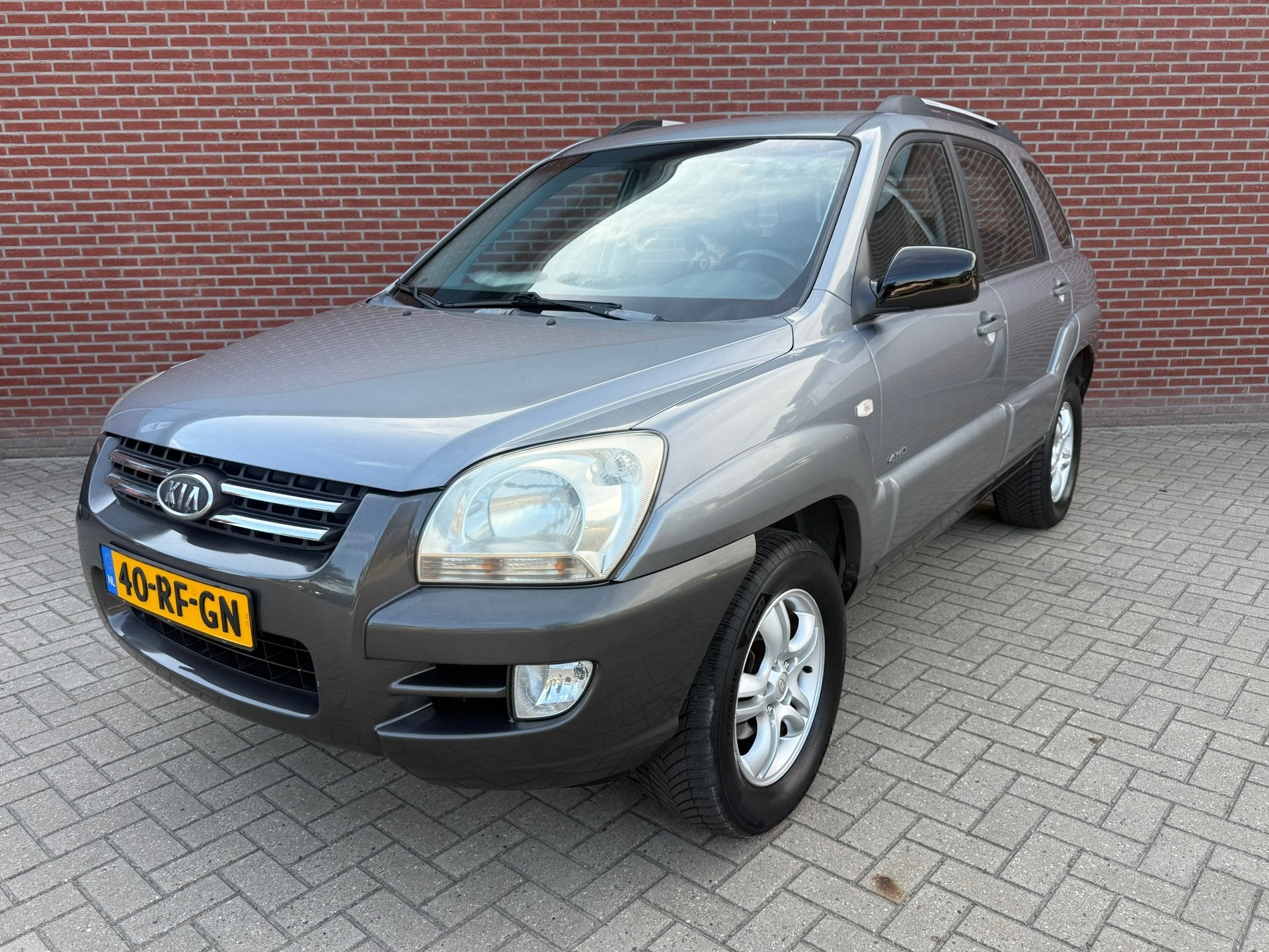 Kia Sportage 2.7 V6 Adventure 4WD / Nap / Airco / Cruise / T, Auto's, Automaat, Gebruikt, 2656 cc, Bedrijf