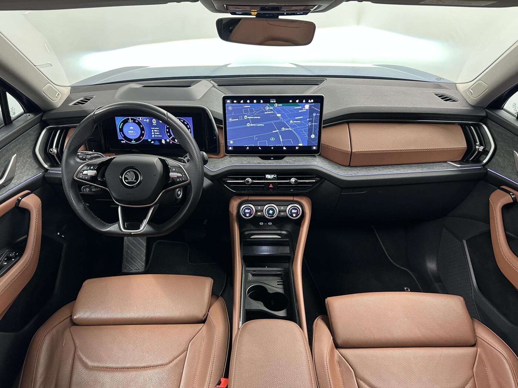 Skoda Kodiaq 1.5 TSI PHEV Sportline Business|Leer|Pano|Head, Auto's, Skoda, 4 cilinders, Met garantie (alle), Blauw, Leder