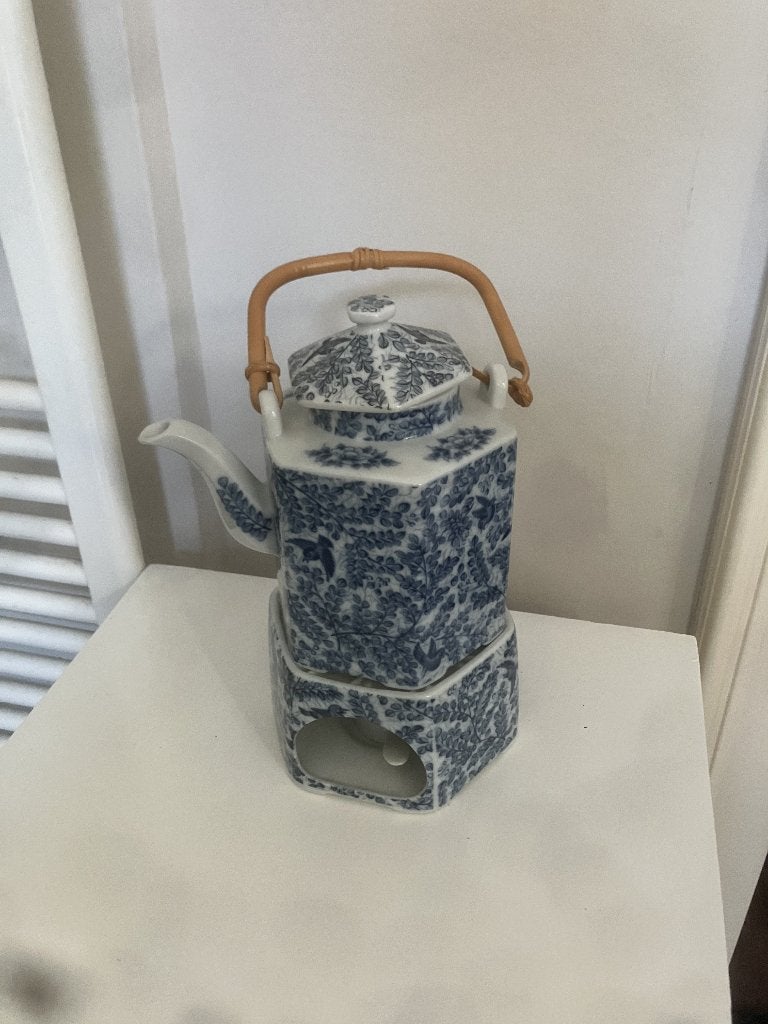 Porseleinen theepot set is voorzien van een warmtehouder, Huis en Inrichting, Keuken | Servies, Overige typen, Ophalen of Verzenden