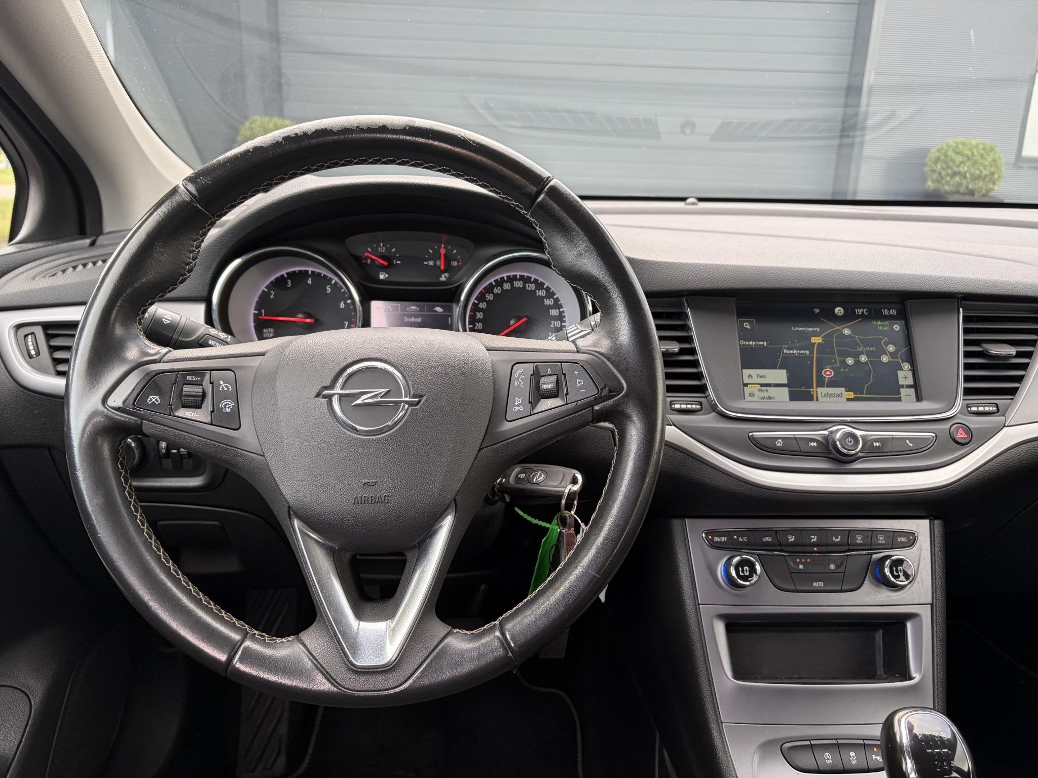 Opel Astra Sports Tourer 1.2 Edition ✓131pk✓2e Eigenaar, Auto's, Voorwielaandrijving, Dealer onderhouden, Stof, 1199 cc