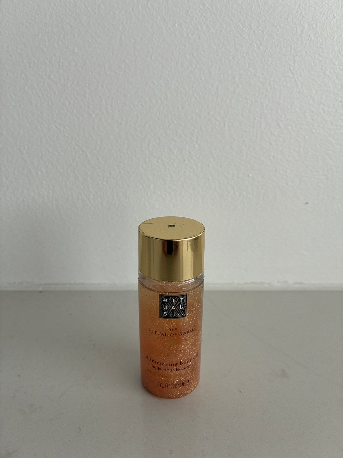 Rituals Karma shimmering body oil, Ophalen of Verzenden, Zo goed als nieuw, Bodylotion, Crème of Olie