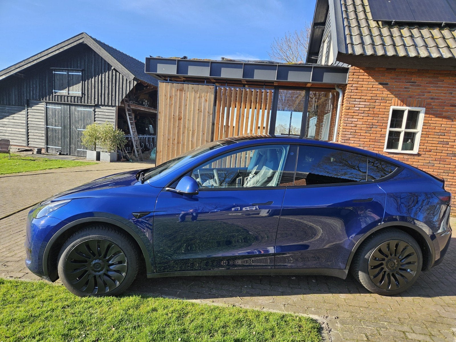 Tesla Model Y 2022 Blauw, Auto's, Automaat, Achterwielaandrijving, Zwart, 23 min