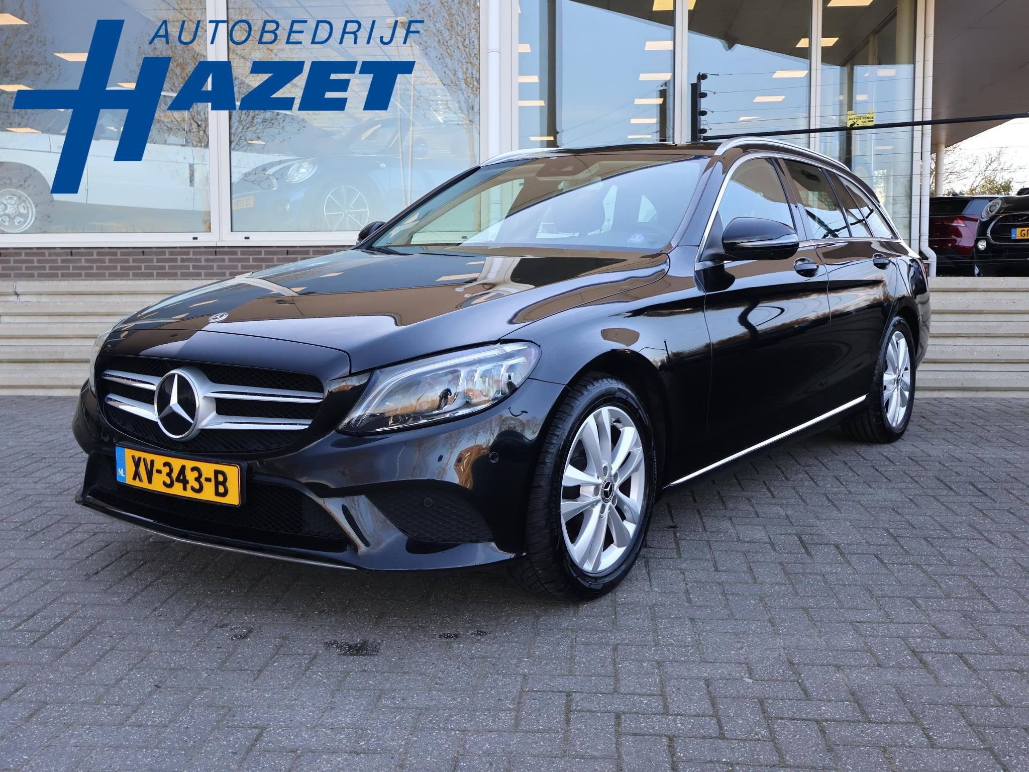 Mercedes-Benz C-klasse Estate 180 AUT. PREMIUM PLUS + BREEDB, Auto's, Mercedes-Benz, Automaat, Zwart, 1595 cc, 750 kg
