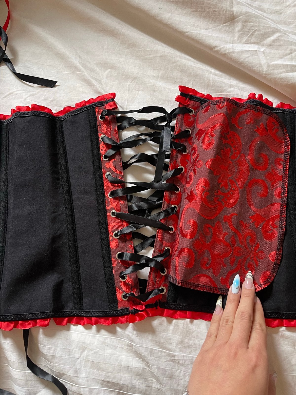 Rood en zwart korset met vetersluiting, Kleding | Dames, Verzenden, Zo goed als nieuw, Rood, Zonder mouw