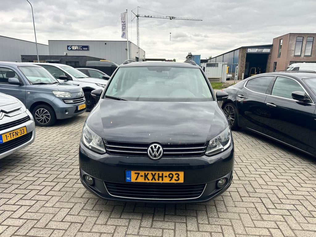 Volkswagen Touran 1.6 TDI 77KW 2011 Zwart 7-Persoons, Auto's, Voorwielaandrijving, Stof, Zwart, 4 cilinders