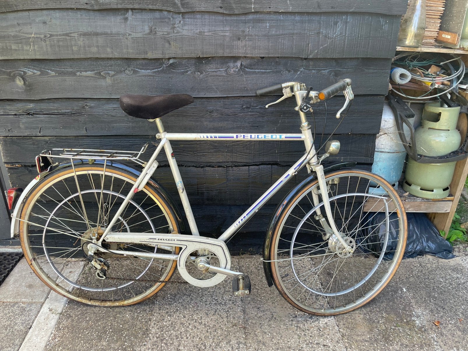 Orginele peutgeot heren fiets, Ophalen