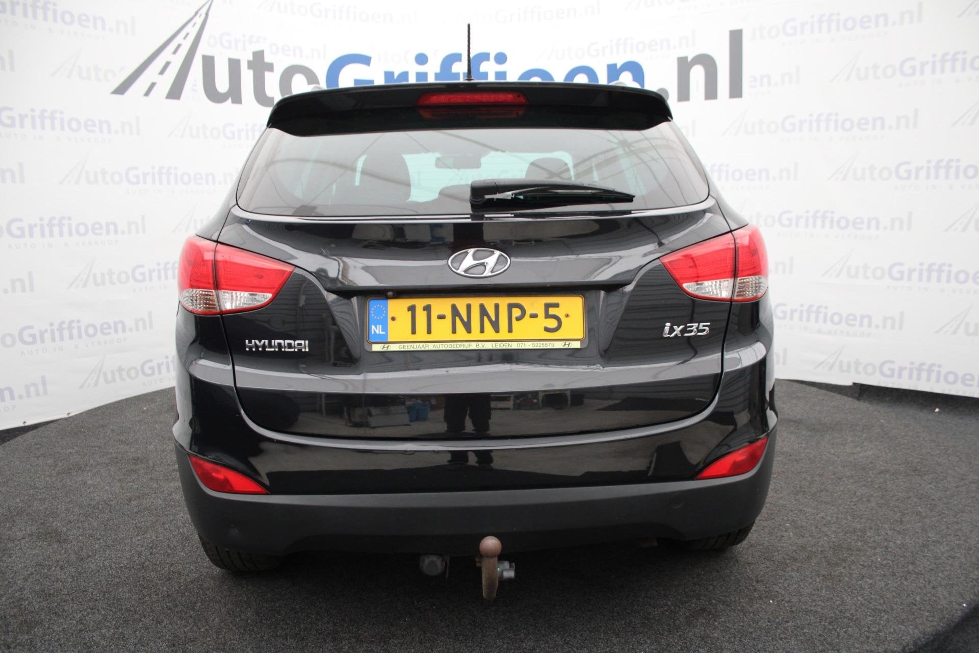Hyundai ix35 2.0i Style nette SUV met trekhaak met nieuwe AP, Auto's, Gebruikt, Zwart, 4 cilinders, Leder en Stof