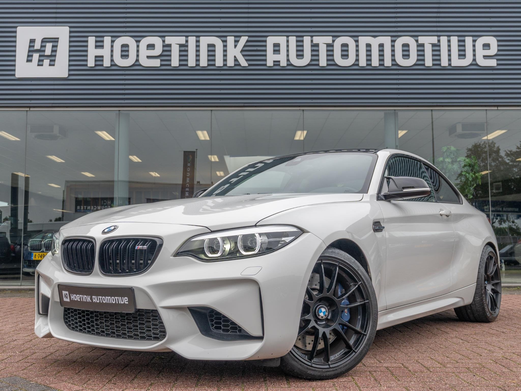 BMW 2-serie Coupé M2 DCT | Harman Kardon | Sport uitlaat |, Gebruikt, 4 stoelen, Wit, Geïmporteerd