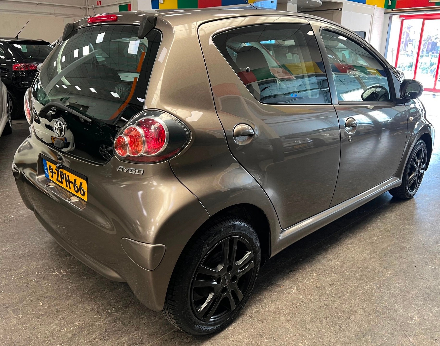 Toyota Aygo 1.0 VVT-i Comfort Orange Elektrische Raam - Airc, Auto's, Voorwielaandrijving, Euro 5, Stof, Gebruikt