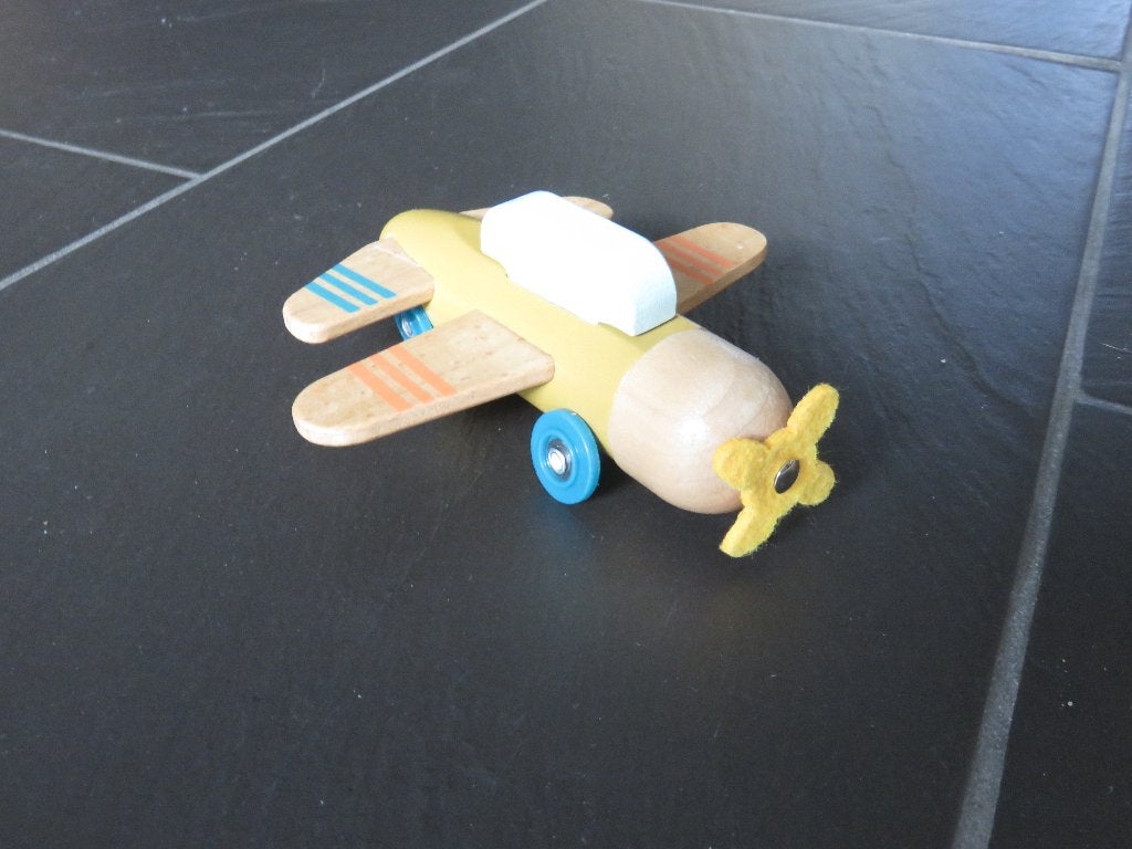 Houten vliegtuig met stoffen propellor, 15cm groot., Ophalen of Verzenden, Zo goed als nieuw, Rij- of Hobbelspeelgoed