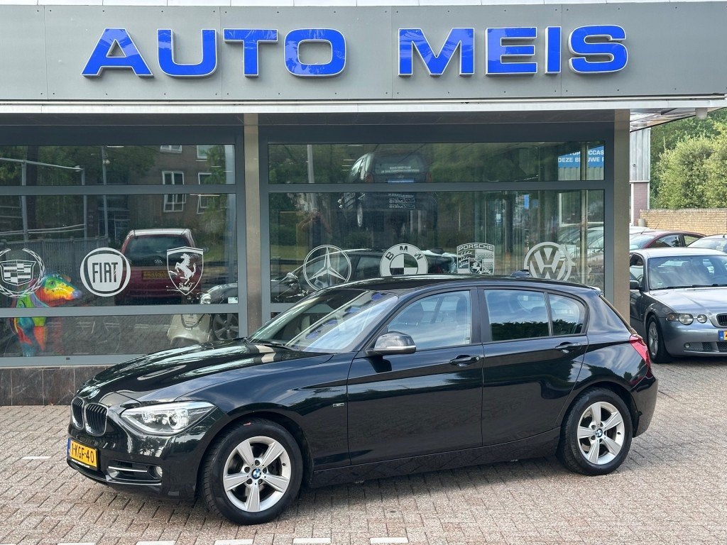 Bmw 1-SERIE 118I Business+ A Navi airco Cruise Trekhaak NAP-, Auto's, BMW, 1-Serie, Euro 5, Achterwielaandrijving, Gebruikt