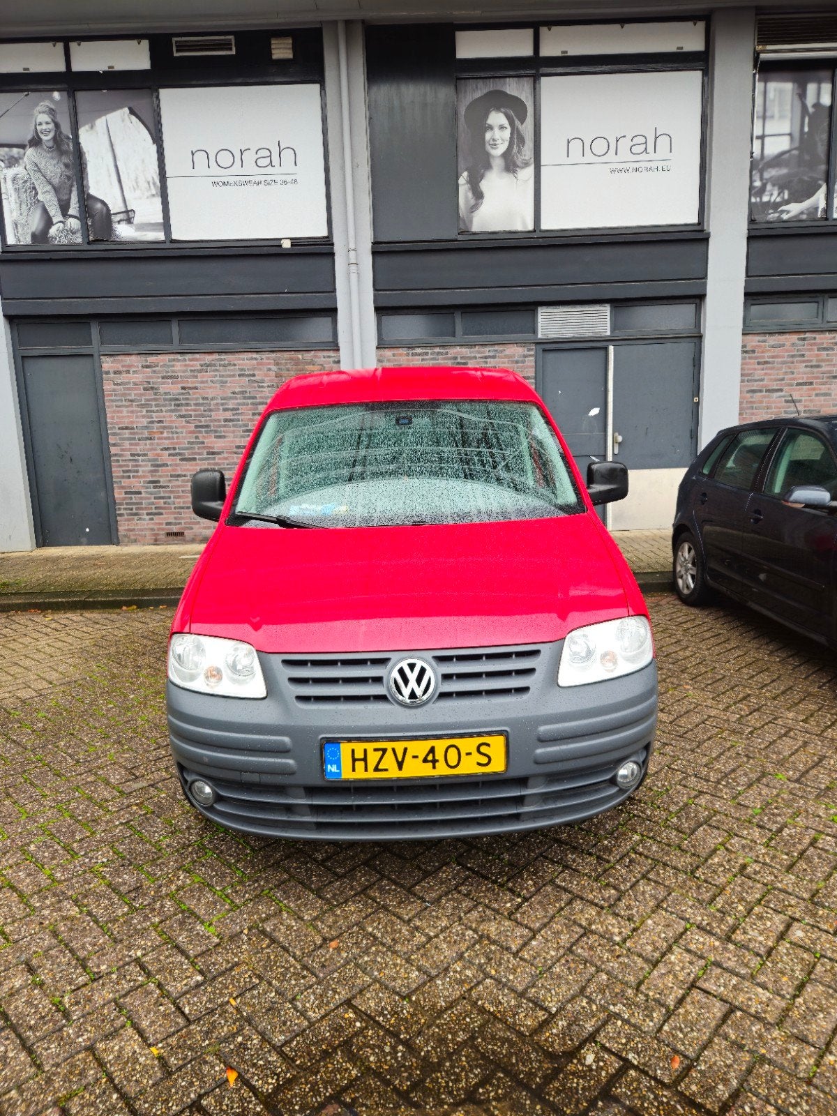 Volkswagen Caddy 1.6 75KW Life 2009 Rood, Auto's, Voorwielaandrijving, Dealer onderhouden, Stof, Handgeschakeld
