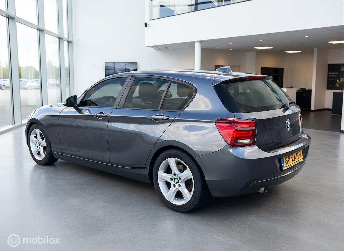 BMW 1-serie 114i EDE Business+Airco|Leder|Xenon, Auto's, 1-Serie, Euro 5, Achterwielaandrijving, Gebruikt