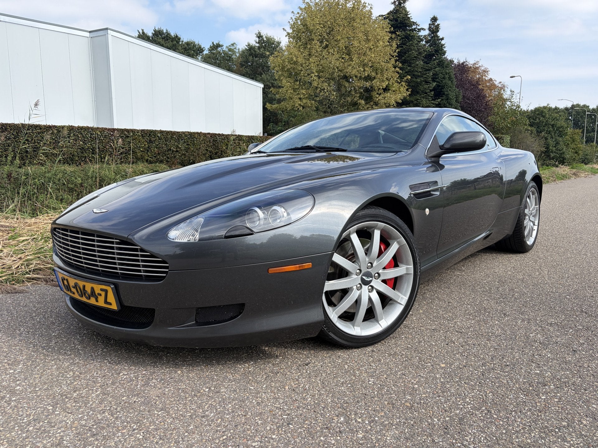 Aston Martin DB9 5.9 V12 Touchtronic / AUTOMAAT / LEER / NAV, Auto's, Automaat, Achterwielaandrijving, Gebruikt, 5935 cc
