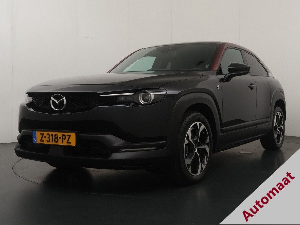 Mazda MX-30 e-Skyactiv R-EV 170 Edition R (bj 2024), Auto's, Mazda, Gebruikt, Leder en Stof, 1753 kg, Hybride Elektrisch/Benzine