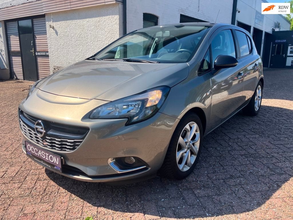 Opel Corsa E 1.4 COLOR EDITION zeer mooi AUDIO CRUISE PDC AL, Auto's, Voorwielaandrijving, Stof, Gebruikt, 23 km/l