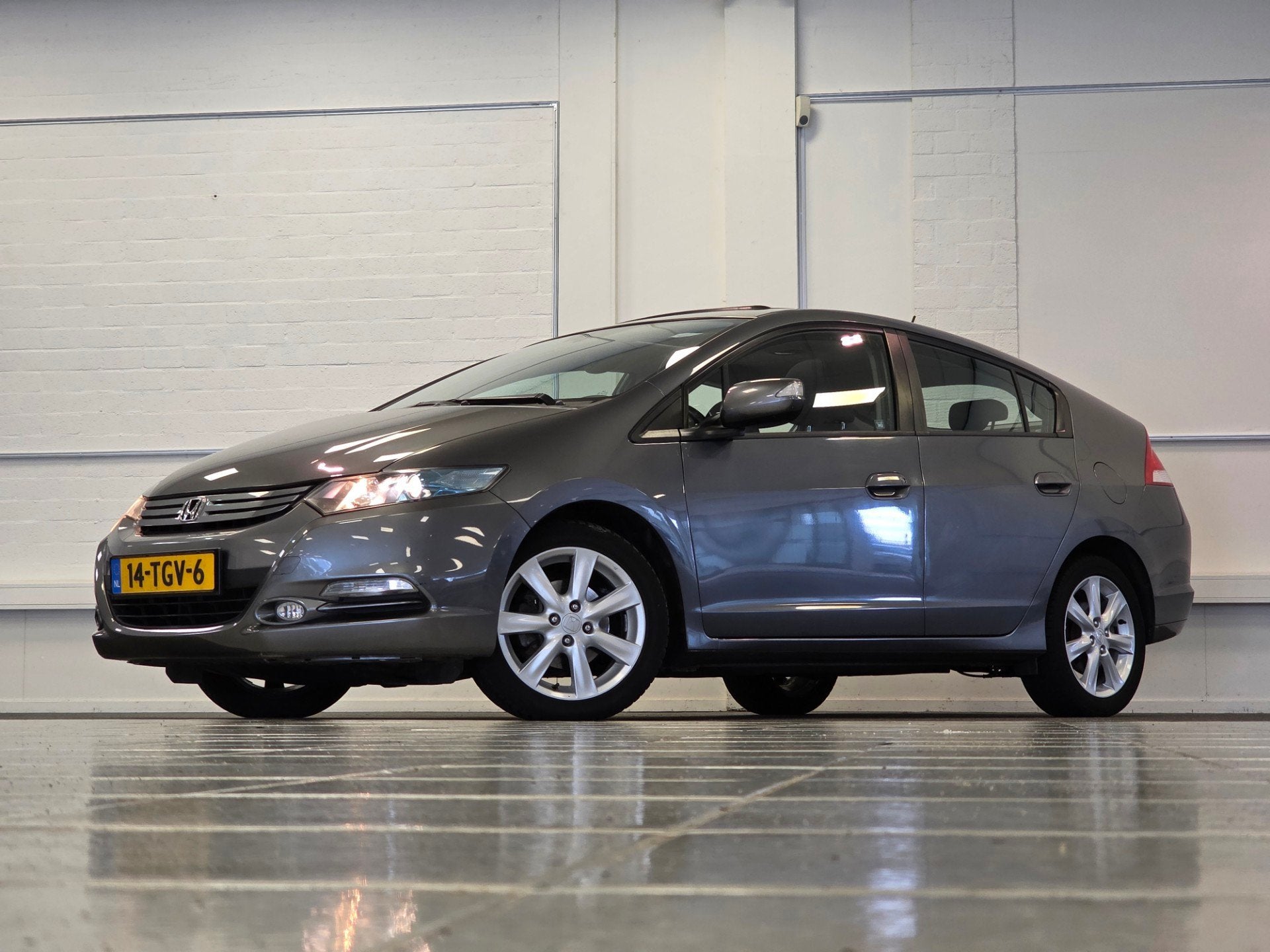 Honda Insight 1.3i Business Mode Schuif/kanteldak Navi PDC, Auto's, Euro 5, Stof, Gebruikt, Zwart