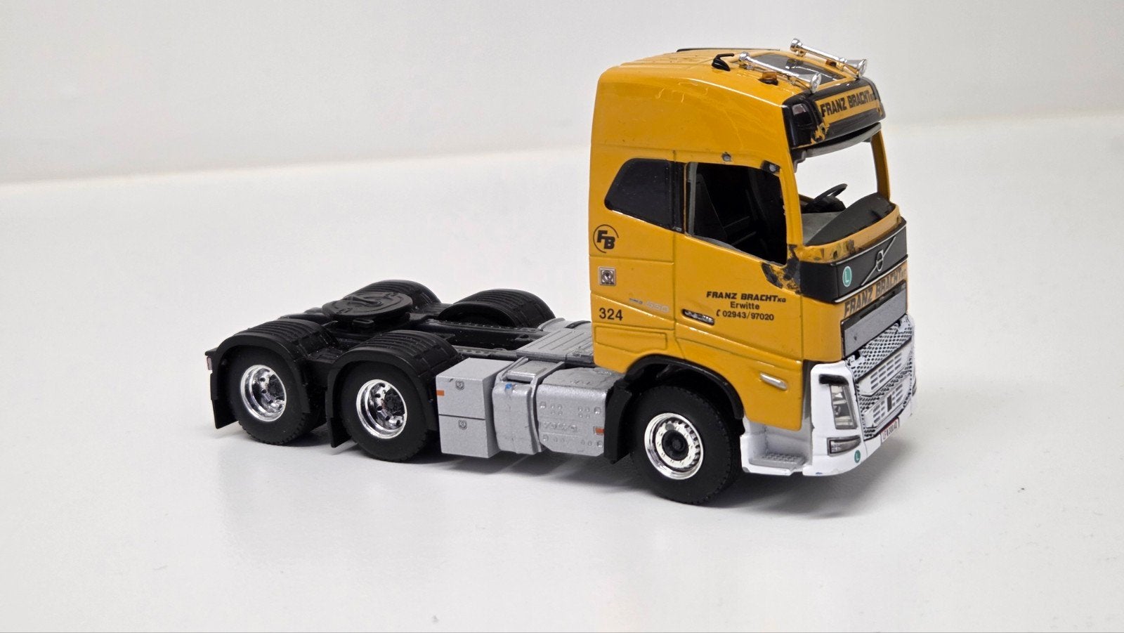 volvo FH5 6x4 B keus WSI, Hobby en Vrije tijd, Modelauto's | 1:50, Ophalen of Verzenden, Zo goed als nieuw, Bus of Vrachtwagen