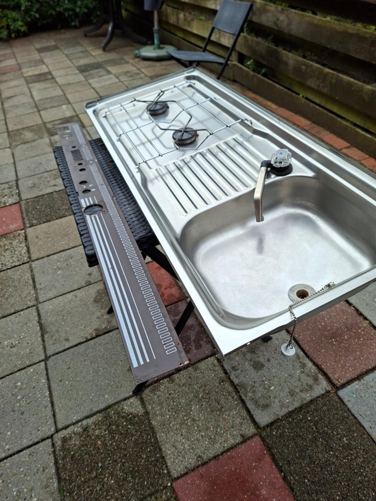 Spoelbak met gasfornuis, Ophalen