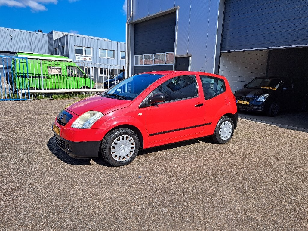Citroën C2 1.1 I 2006 Rood, Auto's, Voorwielaandrijving, Zwart, 4 cilinders, 4 stoelen