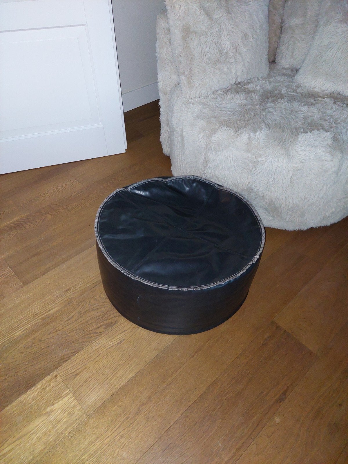 Zwarte  leren poef van Lebel, Minder dan 50 cm, Gebruikt, Rond, Ophalen of Verzenden